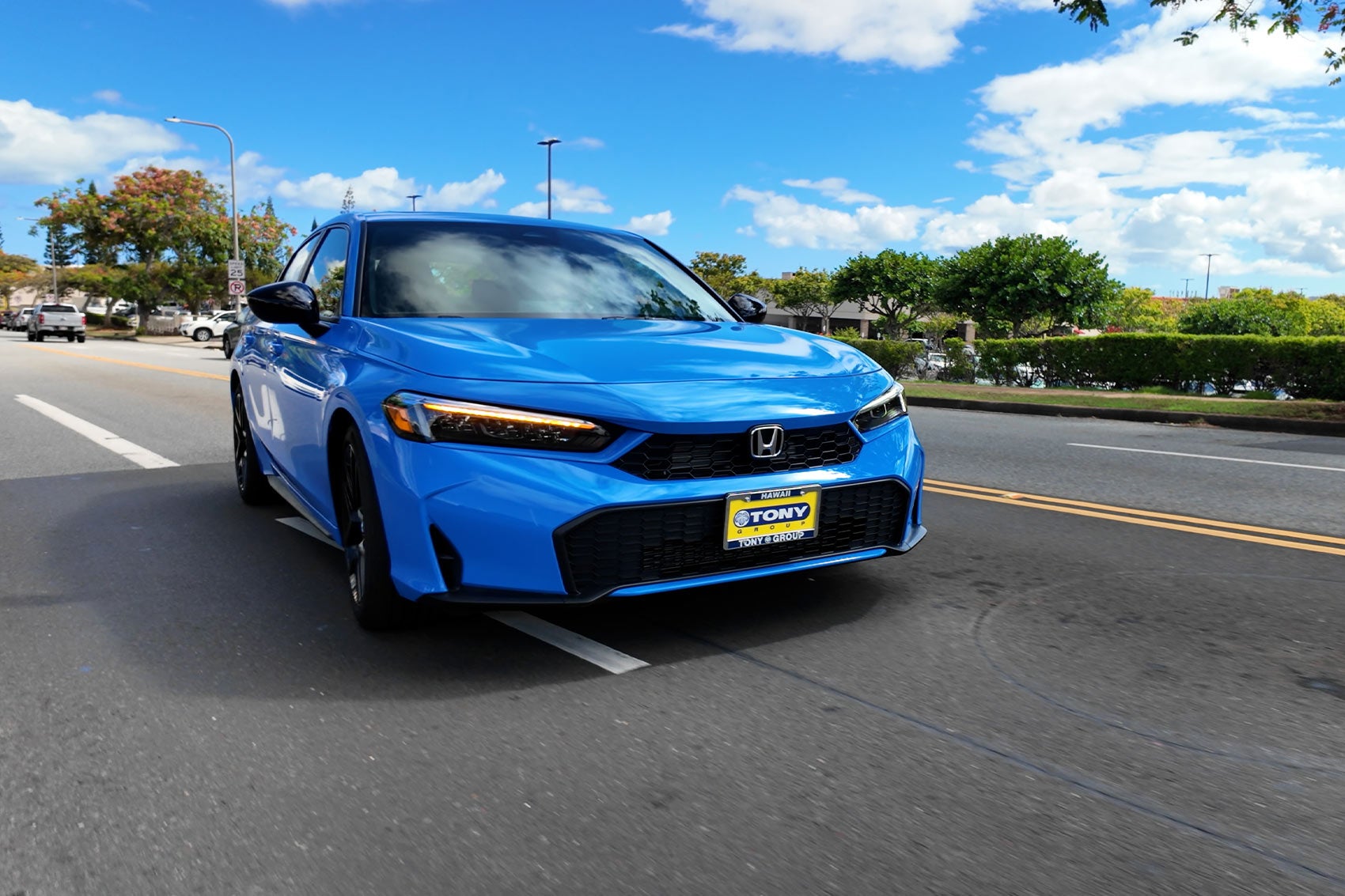 Honda Accord driving through city street